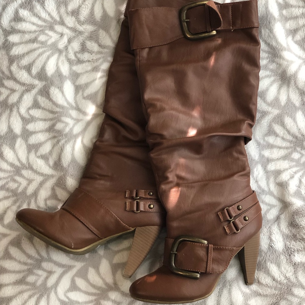 Knee high buckle boots